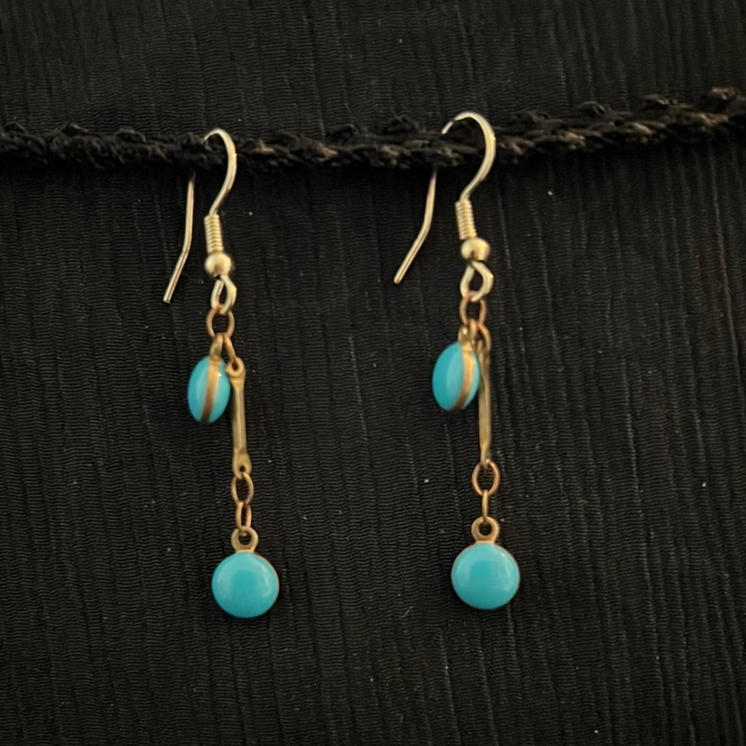 Turquoise beads with gold metal